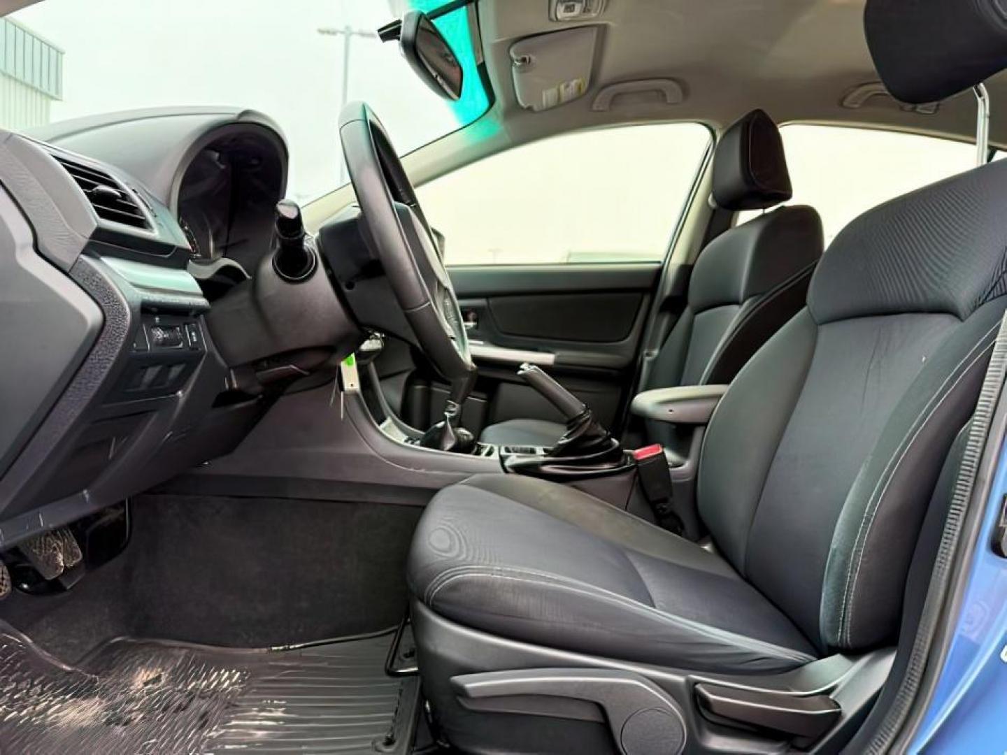 2016 BLUE /Black Subaru Impreza (JF1GPAP66G9) with an 2L H-4 DOHC engine, Manual transmission, located at 1175 N Woodruff Ave, Idaho Falls, ID, 83401, 43.506901, -111.999657 - At Timberline Auto, finding a great deal on your next vehicle is always easy! Our experienced sales staff's goal is to help find you the right vehicle at the right price! Our knowledgeable finance department has options for almost any credit score. We offer extended service contract options to prote - Photo#11