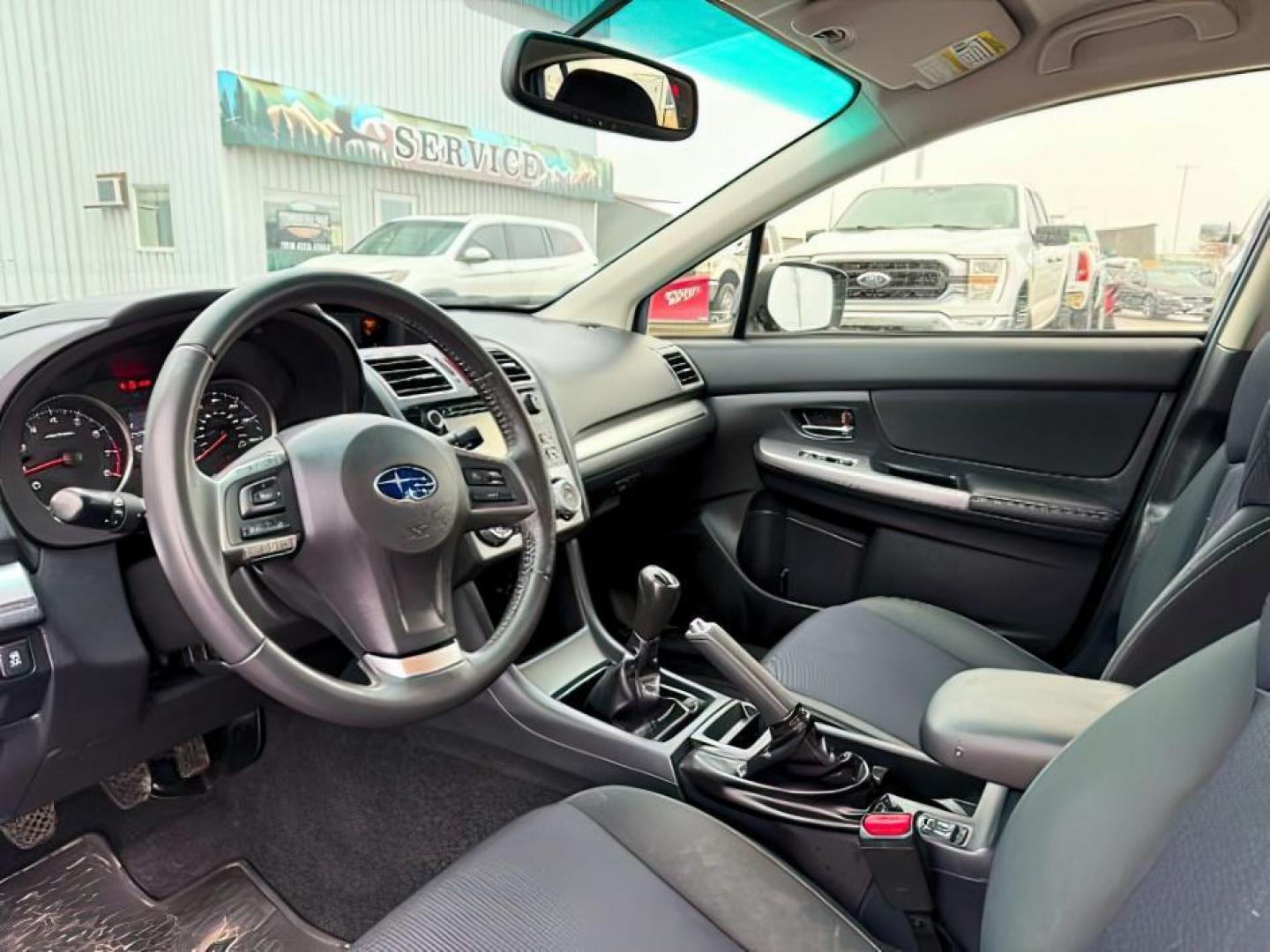 2016 BLUE /Black Subaru Impreza (JF1GPAP66G9) with an 2L H-4 DOHC engine, Manual transmission, located at 1175 N Woodruff Ave, Idaho Falls, ID, 83401, 43.506901, -111.999657 - At Timberline Auto, finding a great deal on your next vehicle is always easy! Our experienced sales staff's goal is to help find you the right vehicle at the right price! Our knowledgeable finance department has options for almost any credit score. We offer extended service contract options to prote - Photo#12