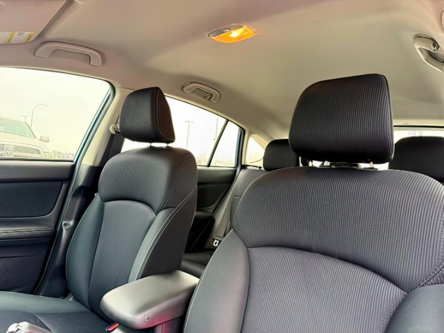 2016 BLUE /Black Subaru Impreza (JF1GPAP66G9) with an 2L H-4 DOHC engine, Manual transmission, located at 1175 N Woodruff Ave, Idaho Falls, ID, 83401, 43.506901, -111.999657 - At Timberline Auto, finding a great deal on your next vehicle is always easy! Our experienced sales staff's goal is to help find you the right vehicle at the right price! Our knowledgeable finance department has options for almost any credit score. We offer extended service contract options to prote - Photo#17