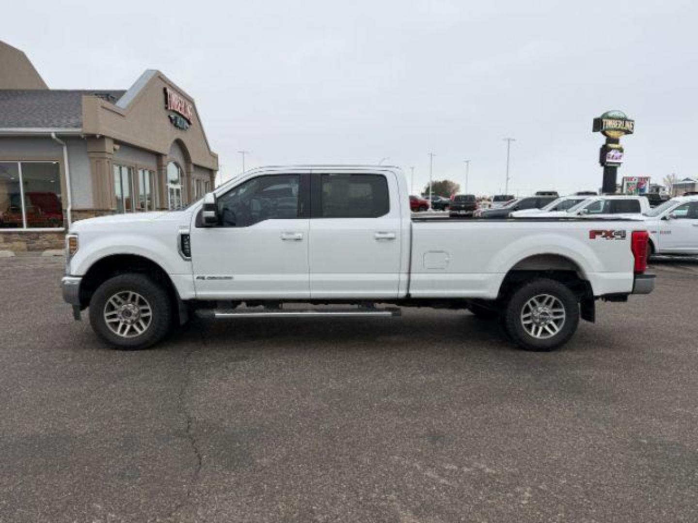 2019 WHITE /Black Ford F-250 (1FT7W2BT8KE) with an Powerstroke 67L V-8 diesel direct injection engine, Automatic transmission, located at 1175 N Woodruff Ave, Idaho Falls, ID, 83401, 43.506901, -111.999657 - At Timberline Auto, finding a great deal on your next vehicle is always easy! Our experienced sales staff's goal is to help find you the right vehicle at the right price! Our knowledgeable finance department has options for almost any credit score. We offer extended service contract options to prote - Photo#1