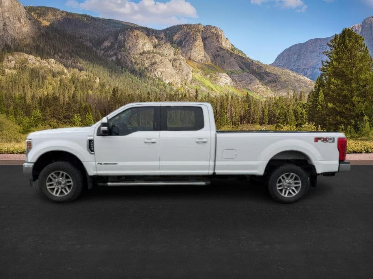 2019 WHITE /Black Ford F-250 (1FT7W2BT8KE) with an Powerstroke 67L V-8 diesel direct injection engine, Automatic transmission, located at 1175 N Woodruff Ave, Idaho Falls, ID, 83401, 43.506901, -111.999657 - At Timberline Auto, finding a great deal on your next vehicle is always easy! Our experienced sales staff's goal is to help find you the right vehicle at the right price! Our knowledgeable finance department has options for almost any credit score. We offer extended service contract options to prote - Photo#0