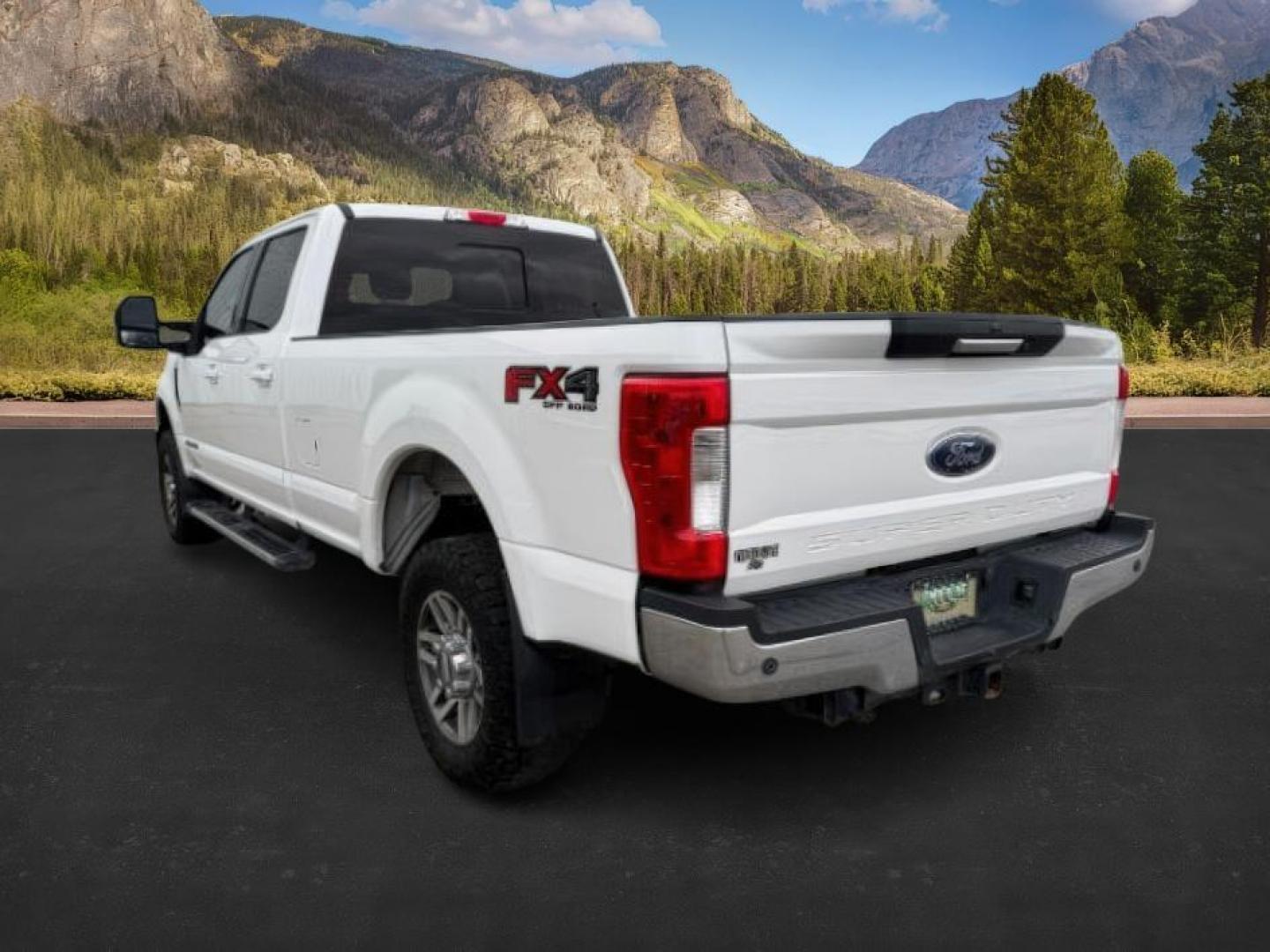 2019 WHITE /Black Ford F-250 (1FT7W2BT8KE) with an Powerstroke 67L V-8 diesel direct injection engine, Automatic transmission, located at 1175 N Woodruff Ave, Idaho Falls, ID, 83401, 43.506901, -111.999657 - At Timberline Auto, finding a great deal on your next vehicle is always easy! Our experienced sales staff's goal is to help find you the right vehicle at the right price! Our knowledgeable finance department has options for almost any credit score. We offer extended service contract options to prote - Photo#2
