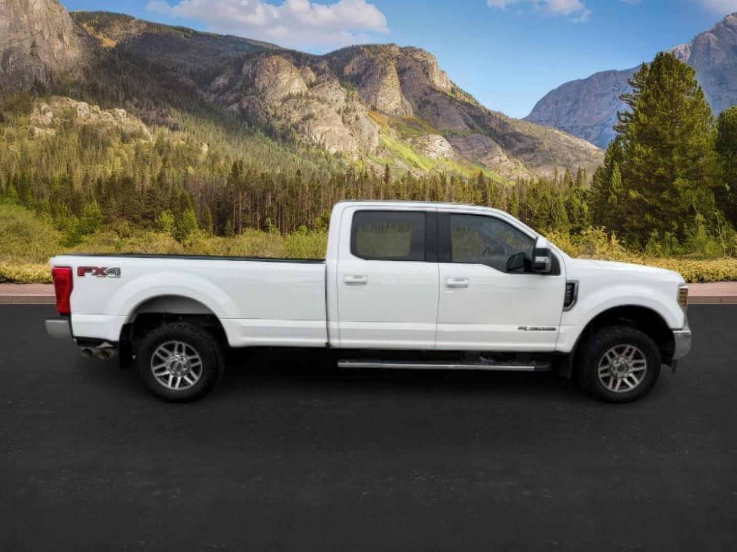 2019 WHITE /Black Ford F-250 (1FT7W2BT8KE) with an Powerstroke 67L V-8 diesel direct injection engine, Automatic transmission, located at 1175 N Woodruff Ave, Idaho Falls, ID, 83401, 43.506901, -111.999657 - At Timberline Auto, finding a great deal on your next vehicle is always easy! Our experienced sales staff's goal is to help find you the right vehicle at the right price! Our knowledgeable finance department has options for almost any credit score. We offer extended service contract options to prote - Photo#7