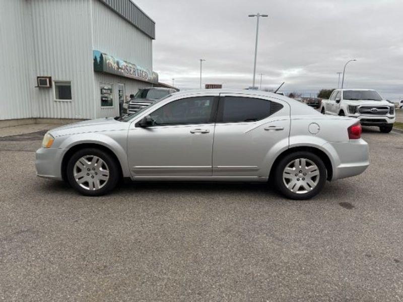 2012 Bright Silver Metallic Clearcoat /Black Dodge Avenger SE (1C3CDZAB5CN) with an 4 Cyl, 2.4L engine, 4-speed automatic transmission, located at 1175 N Woodruff Ave, Idaho Falls, ID, 83401, 43.506901, -111.999657 - <b>Vehicle Details</b><br>Looking for a dependable pre-owned sedan in Idaho Falls, ID? This 2012 Dodge Avenger SE with front-wheel drive and a 2.4L 4-cylinder gasoline engine is a smart choice for drivers who want comfort, style, and practicality in one package. Finished with a refined interior, thi- Photo#1
