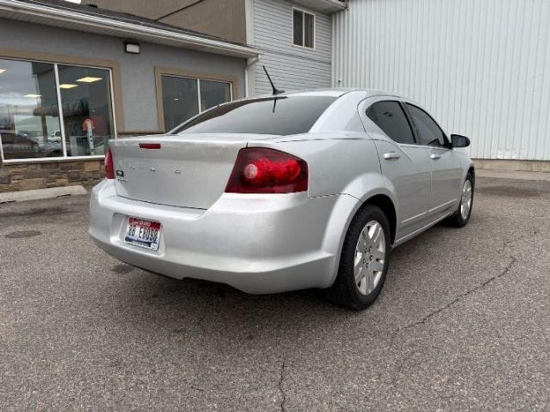 2012 Bright Silver Metallic Clearcoat /Black Dodge Avenger SE (1C3CDZAB5CN) with an 4 Cyl, 2.4L engine, 4-speed automatic transmission, located at 1175 N Woodruff Ave, Idaho Falls, ID, 83401, 43.506901, -111.999657 - <b>Vehicle Details</b><br>Looking for a dependable pre-owned sedan in Idaho Falls, ID? This 2012 Dodge Avenger SE with front-wheel drive and a 2.4L 4-cylinder gasoline engine is a smart choice for drivers who want comfort, style, and practicality in one package. Finished with a refined interior, thi- Photo#4
