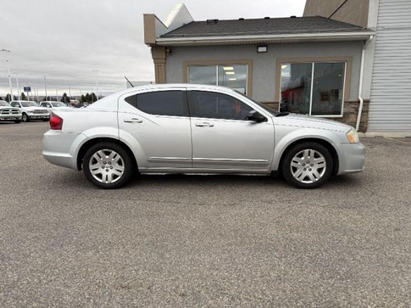 2012 Bright Silver Metallic Clearcoat /Black Dodge Avenger SE (1C3CDZAB5CN) with an 4 Cyl, 2.4L engine, 4-speed automatic transmission, located at 1175 N Woodruff Ave, Idaho Falls, ID, 83401, 43.506901, -111.999657 - <b>Vehicle Details</b><br>Looking for a dependable pre-owned sedan in Idaho Falls, ID? This 2012 Dodge Avenger SE with front-wheel drive and a 2.4L 4-cylinder gasoline engine is a smart choice for drivers who want comfort, style, and practicality in one package. Finished with a refined interior, thi- Photo#5