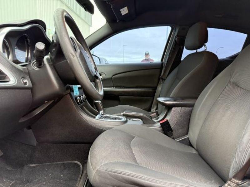 2012 Bright Silver Metallic Clearcoat /Black Dodge Avenger SE (1C3CDZAB5CN) with an 4 Cyl, 2.4L engine, 4-speed automatic transmission, located at 1175 N Woodruff Ave, Idaho Falls, ID, 83401, 43.506901, -111.999657 - <b>Vehicle Details</b><br>Looking for a dependable pre-owned sedan in Idaho Falls, ID? This 2012 Dodge Avenger SE with front-wheel drive and a 2.4L 4-cylinder gasoline engine is a smart choice for drivers who want comfort, style, and practicality in one package. Finished with a refined interior, thi- Photo#10