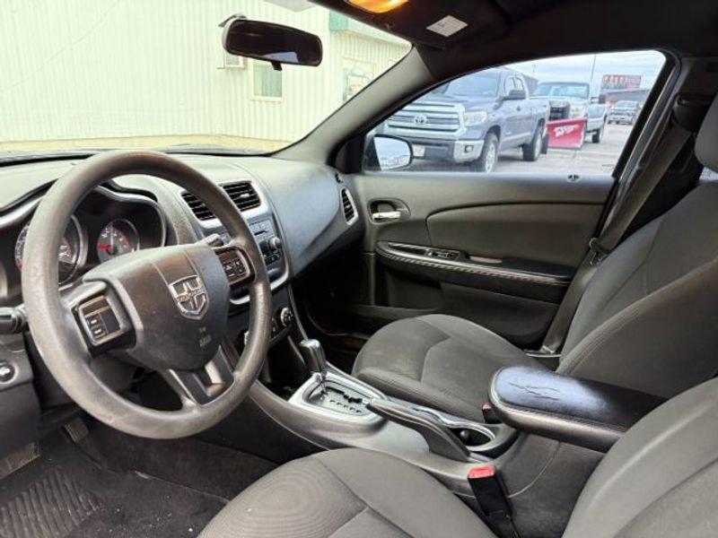 2012 Bright Silver Metallic Clearcoat /Black Dodge Avenger SE (1C3CDZAB5CN) with an 4 Cyl, 2.4L engine, 4-speed automatic transmission, located at 1175 N Woodruff Ave, Idaho Falls, ID, 83401, 43.506901, -111.999657 - <b>Vehicle Details</b><br>Looking for a dependable pre-owned sedan in Idaho Falls, ID? This 2012 Dodge Avenger SE with front-wheel drive and a 2.4L 4-cylinder gasoline engine is a smart choice for drivers who want comfort, style, and practicality in one package. Finished with a refined interior, thi- Photo#11