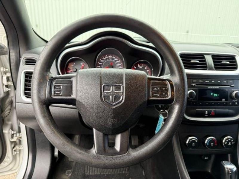 2012 Bright Silver Metallic Clearcoat /Black Dodge Avenger SE (1C3CDZAB5CN) with an 4 Cyl, 2.4L engine, 4-speed automatic transmission, located at 1175 N Woodruff Ave, Idaho Falls, ID, 83401, 43.506901, -111.999657 - <b>Vehicle Details</b><br>Looking for a dependable pre-owned sedan in Idaho Falls, ID? This 2012 Dodge Avenger SE with front-wheel drive and a 2.4L 4-cylinder gasoline engine is a smart choice for drivers who want comfort, style, and practicality in one package. Finished with a refined interior, thi- Photo#12