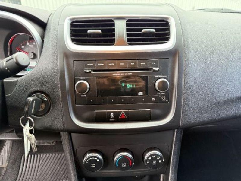 2012 Bright Silver Metallic Clearcoat /Black Dodge Avenger SE (1C3CDZAB5CN) with an 4 Cyl, 2.4L engine, 4-speed automatic transmission, located at 1175 N Woodruff Ave, Idaho Falls, ID, 83401, 43.506901, -111.999657 - <b>Vehicle Details</b><br>Looking for a dependable pre-owned sedan in Idaho Falls, ID? This 2012 Dodge Avenger SE with front-wheel drive and a 2.4L 4-cylinder gasoline engine is a smart choice for drivers who want comfort, style, and practicality in one package. Finished with a refined interior, thi- Photo#13