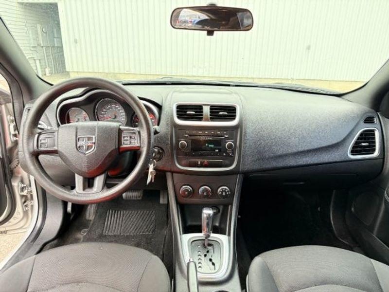 2012 Bright Silver Metallic Clearcoat /Black Dodge Avenger SE (1C3CDZAB5CN) with an 4 Cyl, 2.4L engine, 4-speed automatic transmission, located at 1175 N Woodruff Ave, Idaho Falls, ID, 83401, 43.506901, -111.999657 - <b>Vehicle Details</b><br>Looking for a dependable pre-owned sedan in Idaho Falls, ID? This 2012 Dodge Avenger SE with front-wheel drive and a 2.4L 4-cylinder gasoline engine is a smart choice for drivers who want comfort, style, and practicality in one package. Finished with a refined interior, thi- Photo#16