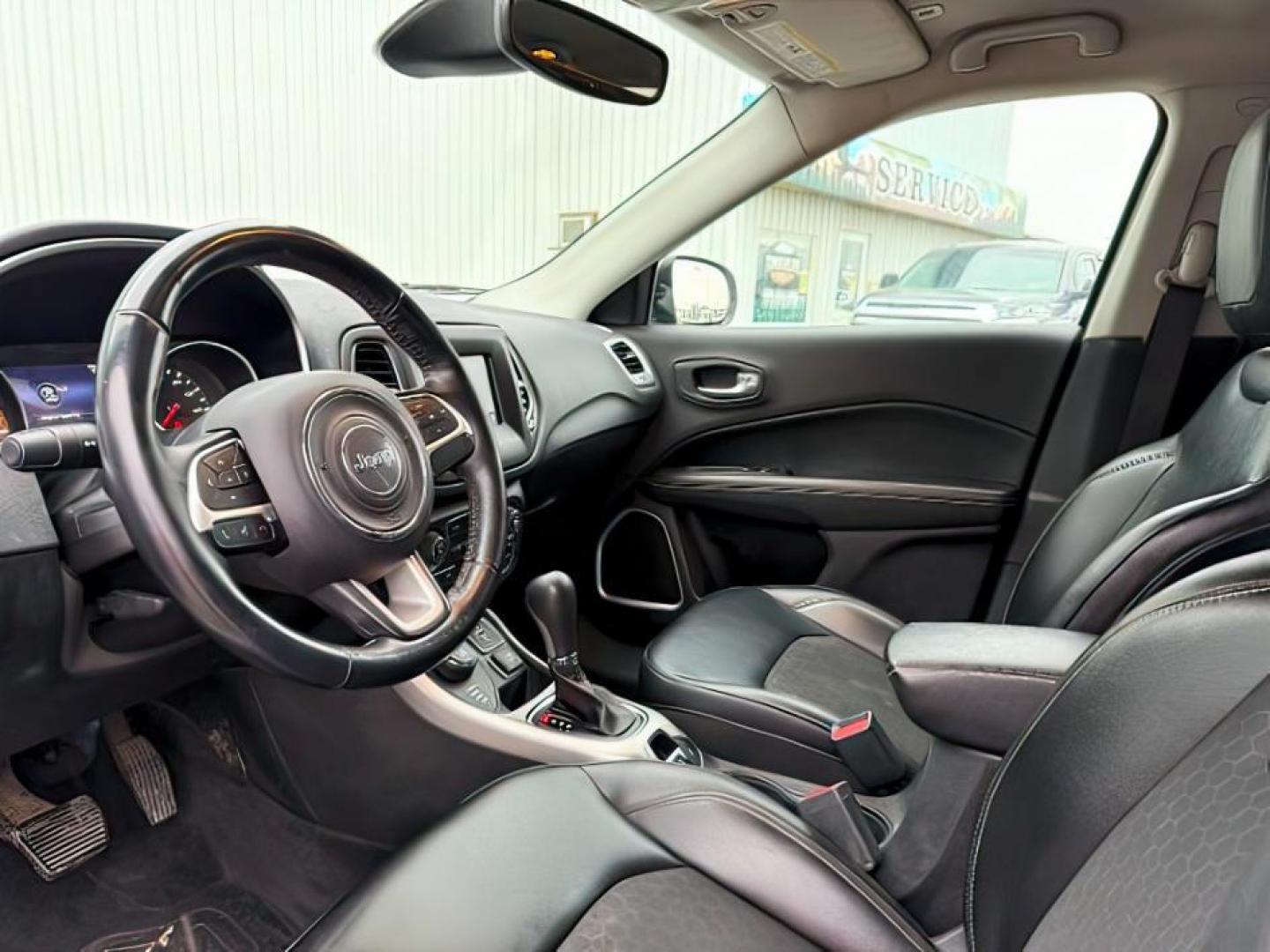 2018 WHITE /CLOTH Jeep Compass (3C4NJDBB6JT) with an 24L engine, Automatic transmission, located at 1175 N Woodruff Ave, Idaho Falls, ID, 83401, 43.506901, -111.999657 - At Timberline Auto, finding a great deal on your next vehicle is always easy! Our experienced sales staff's goal is to help find you the right vehicle at the right price! Our knowledgeable finance department has options for almost any credit score. We offer extended service contract options to prote - Photo#14