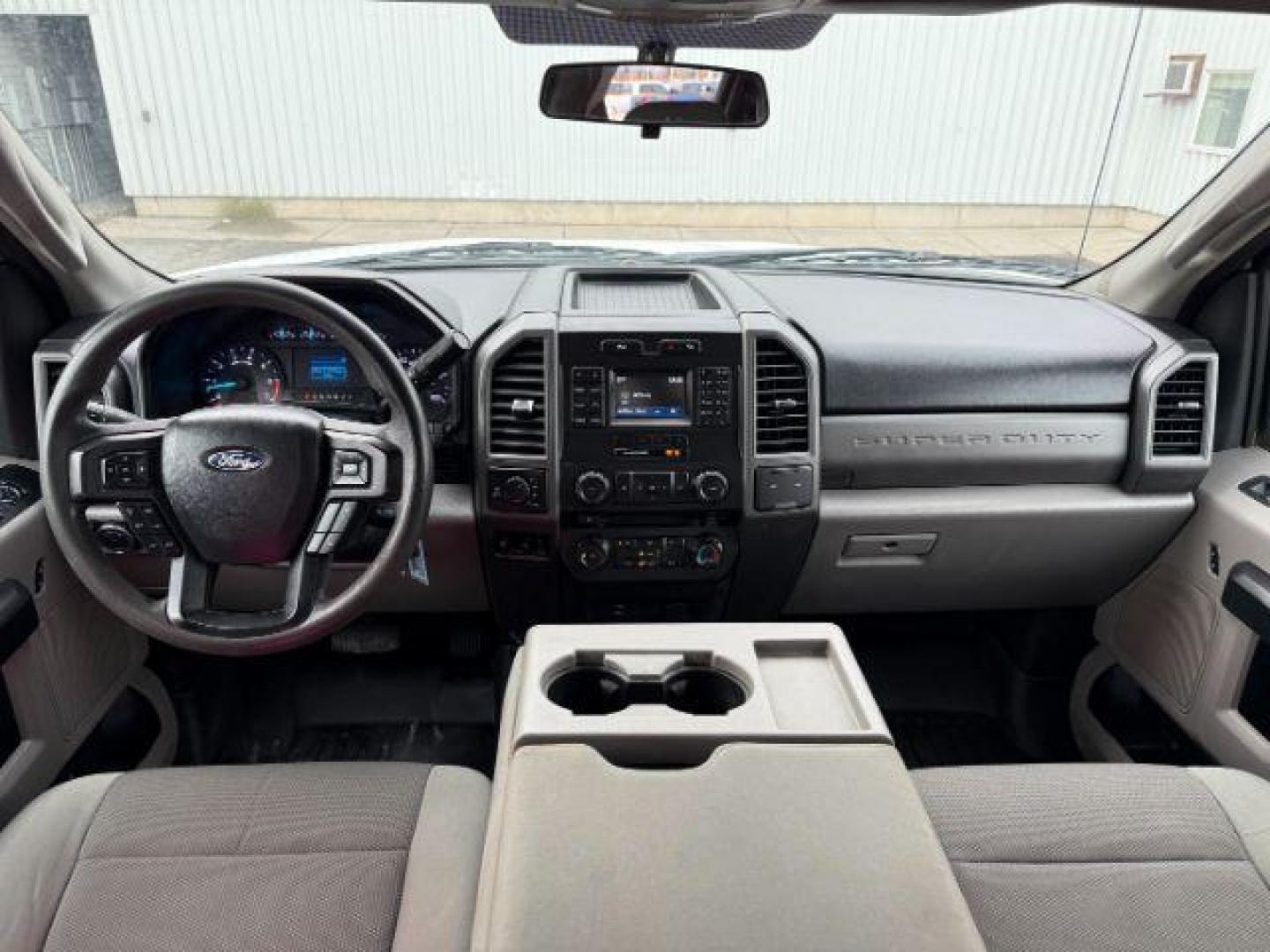 2018 WHITE /CLOTH Ford Super Duty F-350 SRW (1FT8W3B65JE) with an 62 V8 engine, Automatic transmission, located at 1175 N Woodruff Ave, Idaho Falls, ID, 83401, 43.506901, -111.999657 - At Timberline Auto, finding a great deal on your next vehicle is always easy! Our experienced sales staff's goal is to help find you the right vehicle at the right price! Our knowledgeable finance department has options for almost any credit score. We offer extended service contract options to prote - Photo#23