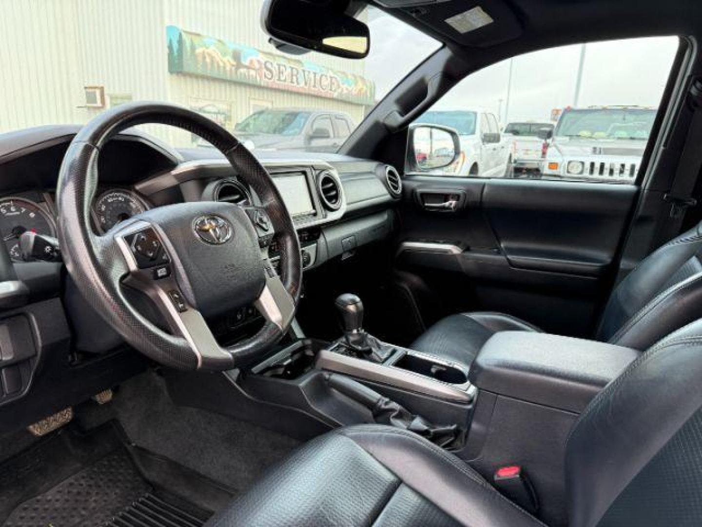 2019 WHITE /CLOTH Toyota Tacoma (3TMGZ5AN7KM) with an 35L V-6 portdirect injection engine, Automatic transmission, located at 1175 N Woodruff Ave, Idaho Falls, ID, 83401, 43.506901, -111.999657 - At Timberline Auto, finding a great deal on your next vehicle is always easy! Our experienced sales staff's goal is to help find you the right vehicle at the right price! Our knowledgeable finance department has options for almost any credit score. We offer extended service contract options to prote - Photo#13