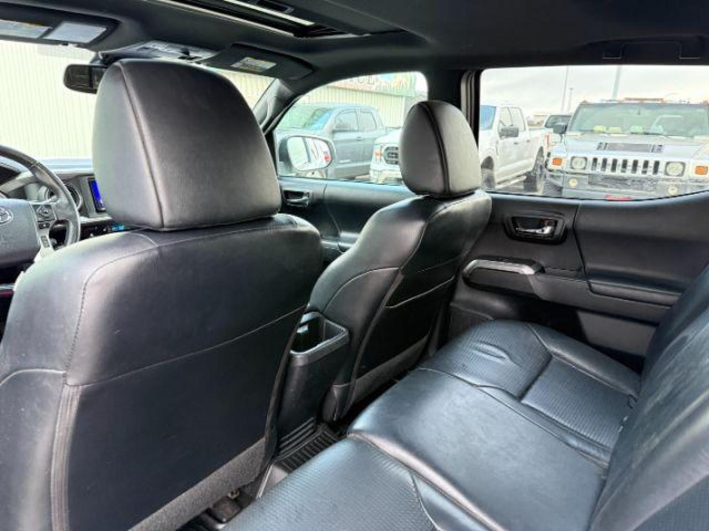 2019 WHITE /CLOTH Toyota Tacoma (3TMGZ5AN7KM) with an 35L V-6 portdirect injection engine, Automatic transmission, located at 1175 N Woodruff Ave, Idaho Falls, ID, 83401, 43.506901, -111.999657 - At Timberline Auto, finding a great deal on your next vehicle is always easy! Our experienced sales staff's goal is to help find you the right vehicle at the right price! Our knowledgeable finance department has options for almost any credit score. We offer extended service contract options to prote - Photo#22