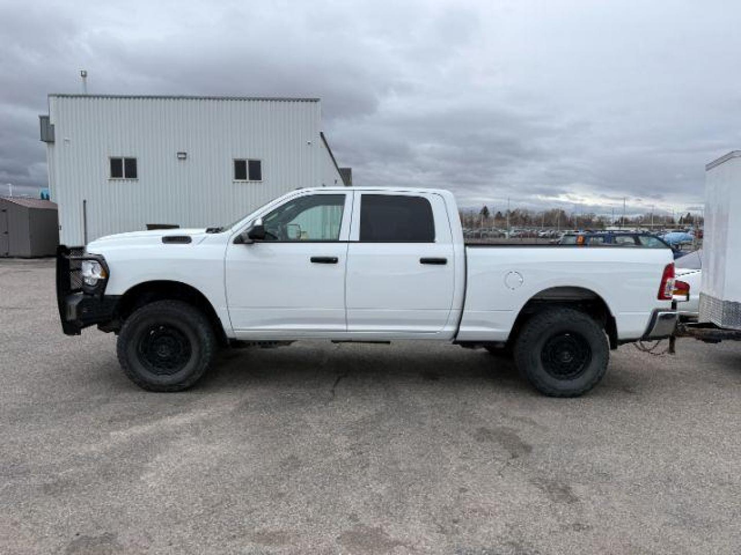 2022 WHITE /Black Ram 2500 (3C6UR5CL6NG) with an Cummins 67L I-6 diesel direct injection engine, Automatic transmission, located at 1175 N Woodruff Ave, Idaho Falls, ID, 83401, 43.506901, -111.999657 - At Timberline Auto, finding a great deal on your next vehicle is always easy! Our experienced sales staff's goal is to help find you the right vehicle at the right price! Our knowledgeable finance department has options for almost any credit score. We offer extended service contract options to prote - Photo#1