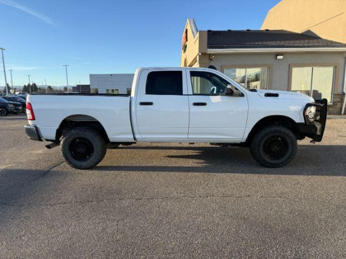 2022 WHITE /Black Ram 2500 (3C6UR5CL6NG) with an Cummins 67L I-6 diesel direct injection engine, Automatic transmission, located at 1175 N Woodruff Ave, Idaho Falls, ID, 83401, 43.506901, -111.999657 - At Timberline Auto, finding a great deal on your next vehicle is always easy! Our experienced sales staff's goal is to help find you the right vehicle at the right price! Our knowledgeable finance department has options for almost any credit score. We offer extended service contract options to prote - Photo#32