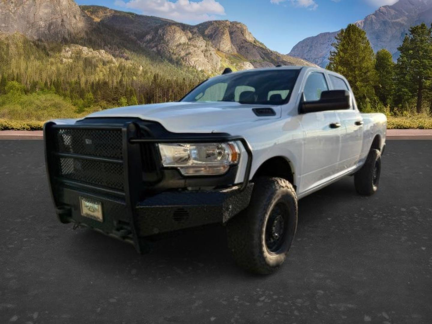 2022 WHITE /Black Ram 2500 (3C6UR5CL6NG) with an Cummins 67L I-6 diesel direct injection engine, Automatic transmission, located at 1175 N Woodruff Ave, Idaho Falls, ID, 83401, 43.506901, -111.999657 - At Timberline Auto, finding a great deal on your next vehicle is always easy! Our experienced sales staff's goal is to help find you the right vehicle at the right price! Our knowledgeable finance department has options for almost any credit score. We offer extended service contract options to prote - Photo#0