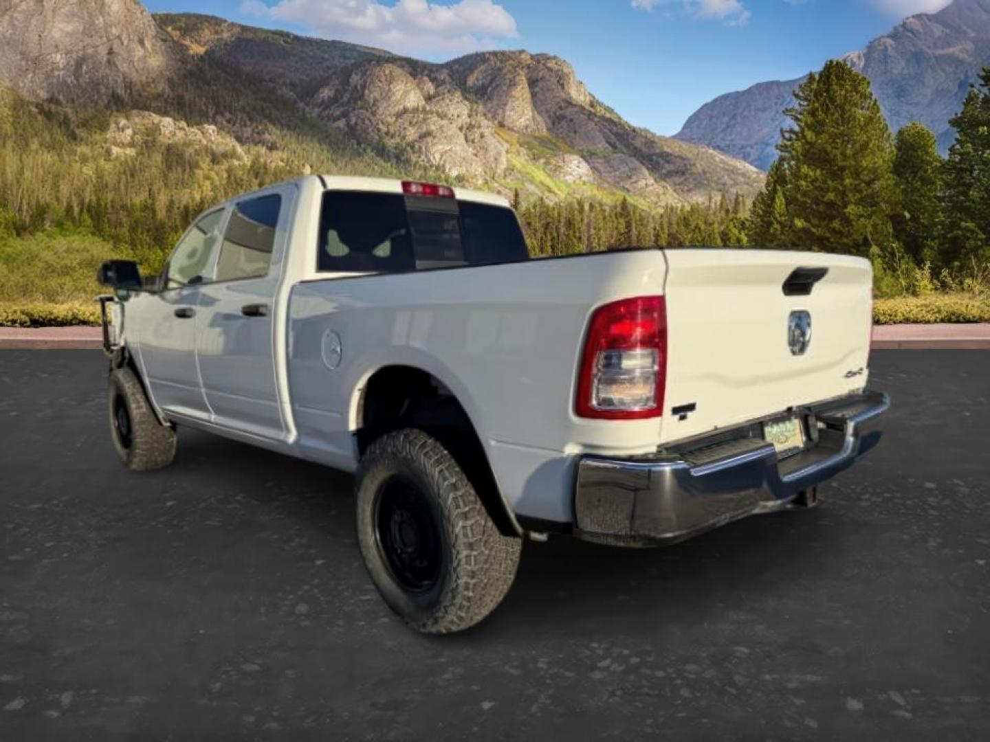 2022 WHITE /Black Ram 2500 (3C6UR5CL6NG) with an Cummins 67L I-6 diesel direct injection engine, Automatic transmission, located at 1175 N Woodruff Ave, Idaho Falls, ID, 83401, 43.506901, -111.999657 - At Timberline Auto, finding a great deal on your next vehicle is always easy! Our experienced sales staff's goal is to help find you the right vehicle at the right price! Our knowledgeable finance department has options for almost any credit score. We offer extended service contract options to prote - Photo#2