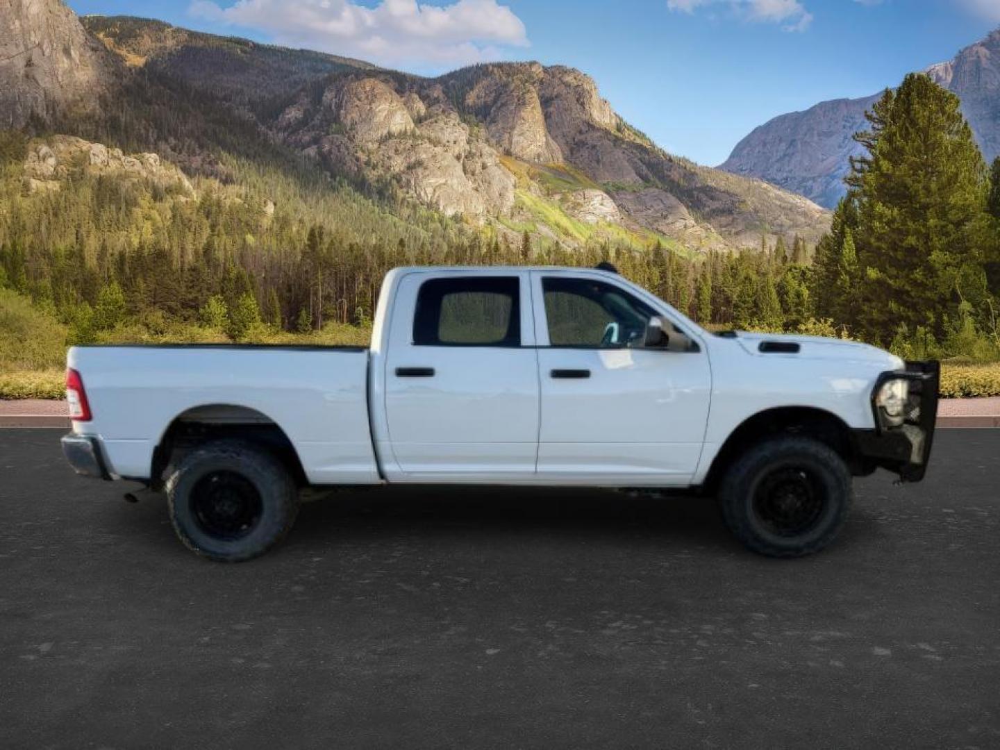 2022 WHITE /Black Ram 2500 (3C6UR5CL6NG) with an Cummins 67L I-6 diesel direct injection engine, Automatic transmission, located at 1175 N Woodruff Ave, Idaho Falls, ID, 83401, 43.506901, -111.999657 - At Timberline Auto, finding a great deal on your next vehicle is always easy! Our experienced sales staff's goal is to help find you the right vehicle at the right price! Our knowledgeable finance department has options for almost any credit score. We offer extended service contract options to prote - Photo#7