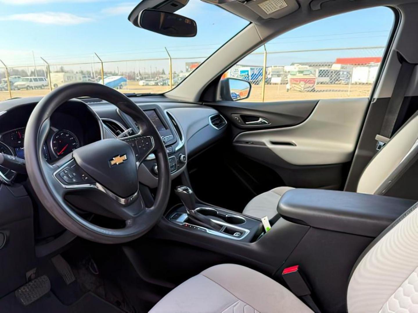 2020 GRAY /Jet Black Chevrolet Equinox (2GNAXTEV5L6) with an 15L I-4 gasoline direct injection engine, Automatic transmission, located at 1175 N Woodruff Ave, Idaho Falls, ID, 83401, 43.506901, -111.999657 - At Timberline Auto, finding a great deal on your next vehicle is always easy! Our experienced sales staff's goal is to help find you the right vehicle at the right price! Our knowledgeable finance department has options for almost any credit score. We offer extended service contract options to prote - Photo#14