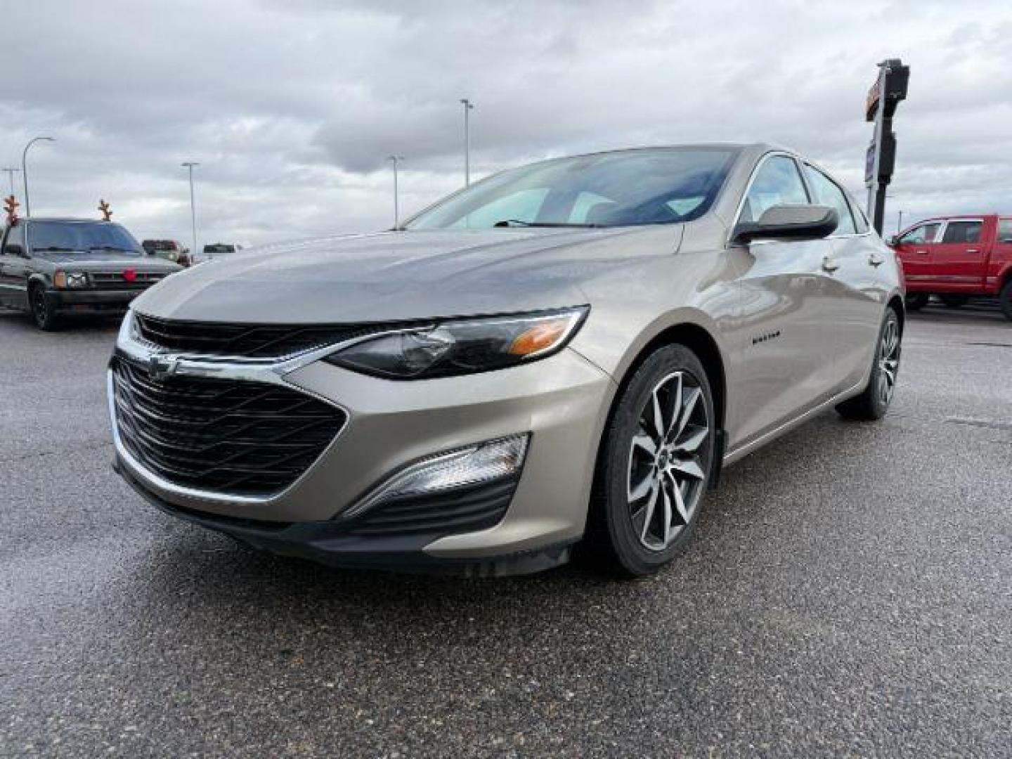 2022 GOLD /Jet Black Chevrolet Malibu (1G1ZG5ST6NF) with an EcoTec3 15L I-4 gasoline direct injection engine, Automatic transmission, located at 1175 N Woodruff Ave, Idaho Falls, ID, 83401, 43.506901, -111.999657 - At Timberline Auto, finding a great deal on your next vehicle is always easy! Our experienced sales staff's goal is to help find you the right vehicle at the right price! Our knowledgeable finance department has options for almost any credit score. We offer extended service contract options to prote - Photo#1