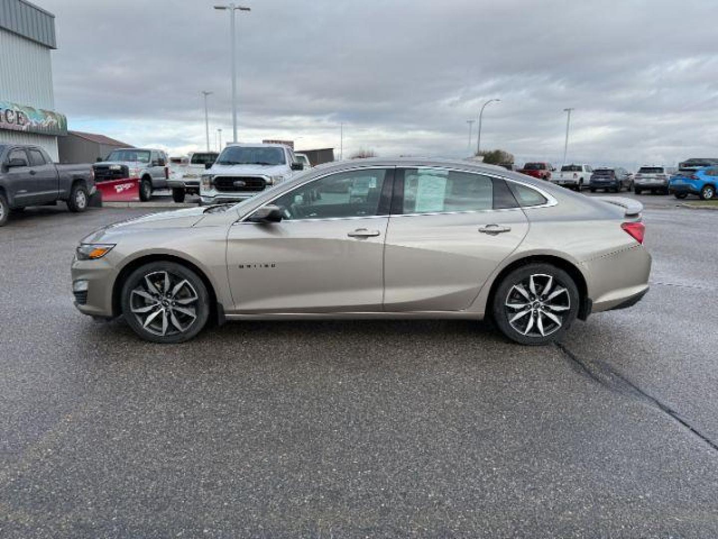 2022 GOLD /Jet Black Chevrolet Malibu (1G1ZG5ST6NF) with an EcoTec3 15L I-4 gasoline direct injection engine, Automatic transmission, located at 1175 N Woodruff Ave, Idaho Falls, ID, 83401, 43.506901, -111.999657 - At Timberline Auto, finding a great deal on your next vehicle is always easy! Our experienced sales staff's goal is to help find you the right vehicle at the right price! Our knowledgeable finance department has options for almost any credit score. We offer extended service contract options to prote - Photo#2