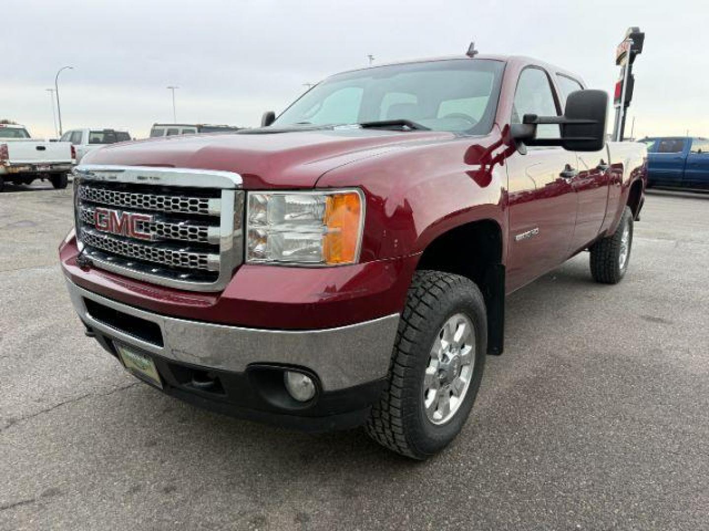 2014 MAROON /Ebony GMC Sierra 2500HD (1GT120C85EF) with an Duramax 66L V-8 diesel direct injection engine, Automatic transmission, located at 1175 N Woodruff Ave, Idaho Falls, ID, 83401, 43.506901, -111.999657 - At Timberline Auto, finding a great deal on your next vehicle is always easy! Our experienced sales staff's goal is to help find you the right vehicle at the right price! Our knowledgeable finance department has options for almost any credit score. We offer extended service contract options to prote - Photo#21