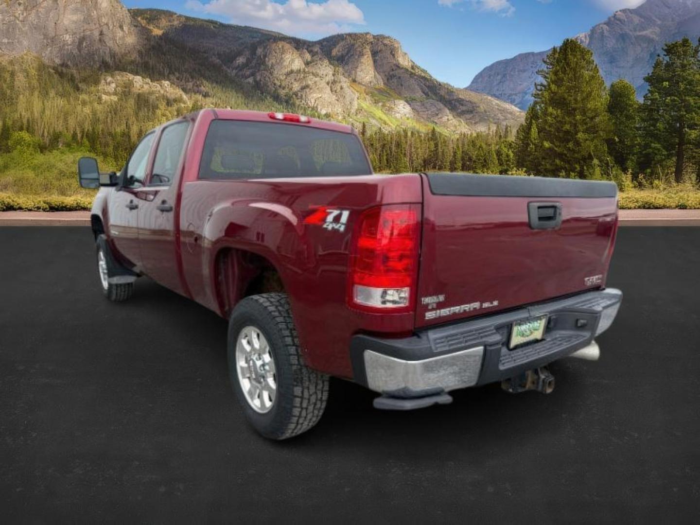 2014 MAROON /Ebony GMC Sierra 2500HD (1GT120C85EF) with an Duramax 66L V-8 diesel direct injection engine, Automatic transmission, located at 1175 N Woodruff Ave, Idaho Falls, ID, 83401, 43.506901, -111.999657 - At Timberline Auto, finding a great deal on your next vehicle is always easy! Our experienced sales staff's goal is to help find you the right vehicle at the right price! Our knowledgeable finance department has options for almost any credit score. We offer extended service contract options to prote - Photo#2