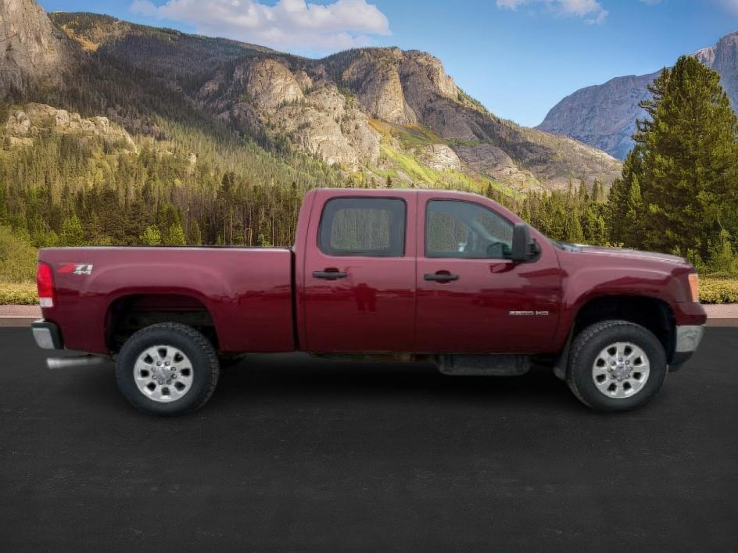 2014 MAROON /Ebony GMC Sierra 2500HD (1GT120C85EF) with an Duramax 66L V-8 diesel direct injection engine, Automatic transmission, located at 1175 N Woodruff Ave, Idaho Falls, ID, 83401, 43.506901, -111.999657 - At Timberline Auto, finding a great deal on your next vehicle is always easy! Our experienced sales staff's goal is to help find you the right vehicle at the right price! Our knowledgeable finance department has options for almost any credit score. We offer extended service contract options to prote - Photo#5