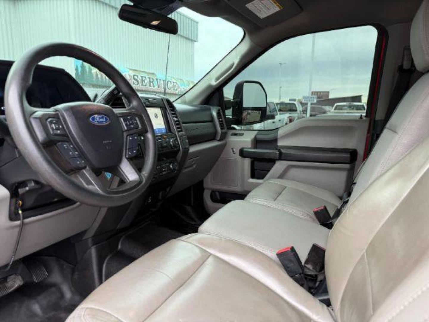 2021 RED /Medium Earth Gray Ford F-250 (1FT7W2B65ME) with an 62L V-8 variable valve control engine, Automatic transmission, located at 1175 N Woodruff Ave, Idaho Falls, ID, 83401, 43.506901, -111.999657 - At Timberline Auto, finding a great deal on your next vehicle is always easy! Our experienced sales staff's goal is to help find you the right vehicle at the right price! Our knowledgeable finance department has options for almost any credit score. We offer extended service contract options to prote - Photo#39