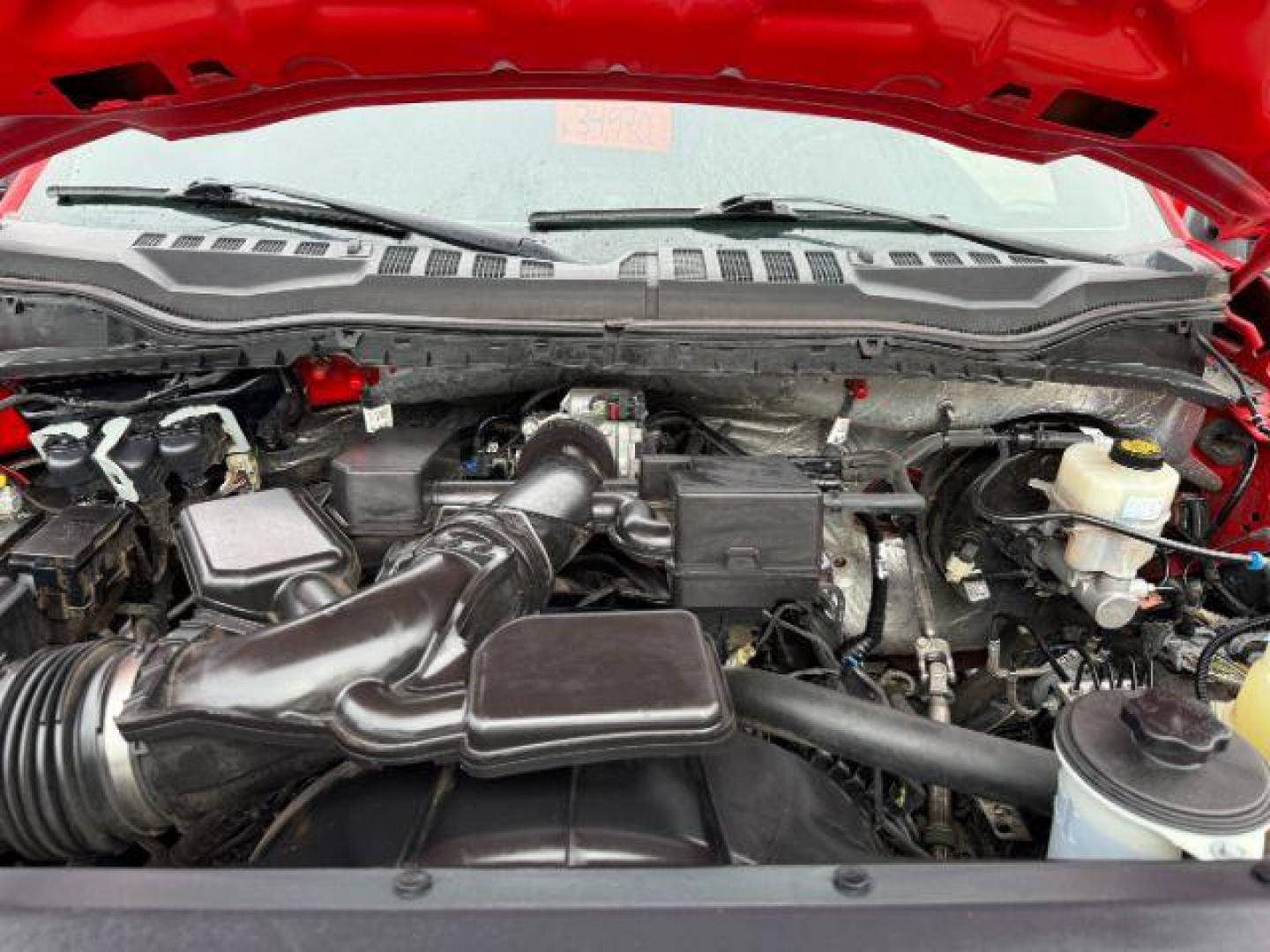 2021 RED /Medium Earth Gray Ford F-250 (1FT7W2B65ME) with an 62L V-8 variable valve control engine, Automatic transmission, located at 1175 N Woodruff Ave, Idaho Falls, ID, 83401, 43.506901, -111.999657 - At Timberline Auto, finding a great deal on your next vehicle is always easy! Our experienced sales staff's goal is to help find you the right vehicle at the right price! Our knowledgeable finance department has options for almost any credit score. We offer extended service contract options to prote - Photo#49