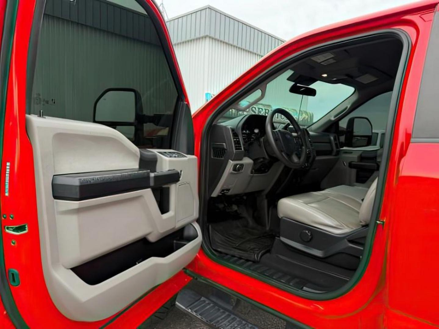 2021 RED /Medium Earth Gray Ford F-250 (1FT7W2B65ME) with an 62L V-8 variable valve control engine, Automatic transmission, located at 1175 N Woodruff Ave, Idaho Falls, ID, 83401, 43.506901, -111.999657 - At Timberline Auto, finding a great deal on your next vehicle is always easy! Our experienced sales staff's goal is to help find you the right vehicle at the right price! Our knowledgeable finance department has options for almost any credit score. We offer extended service contract options to prote - Photo#12