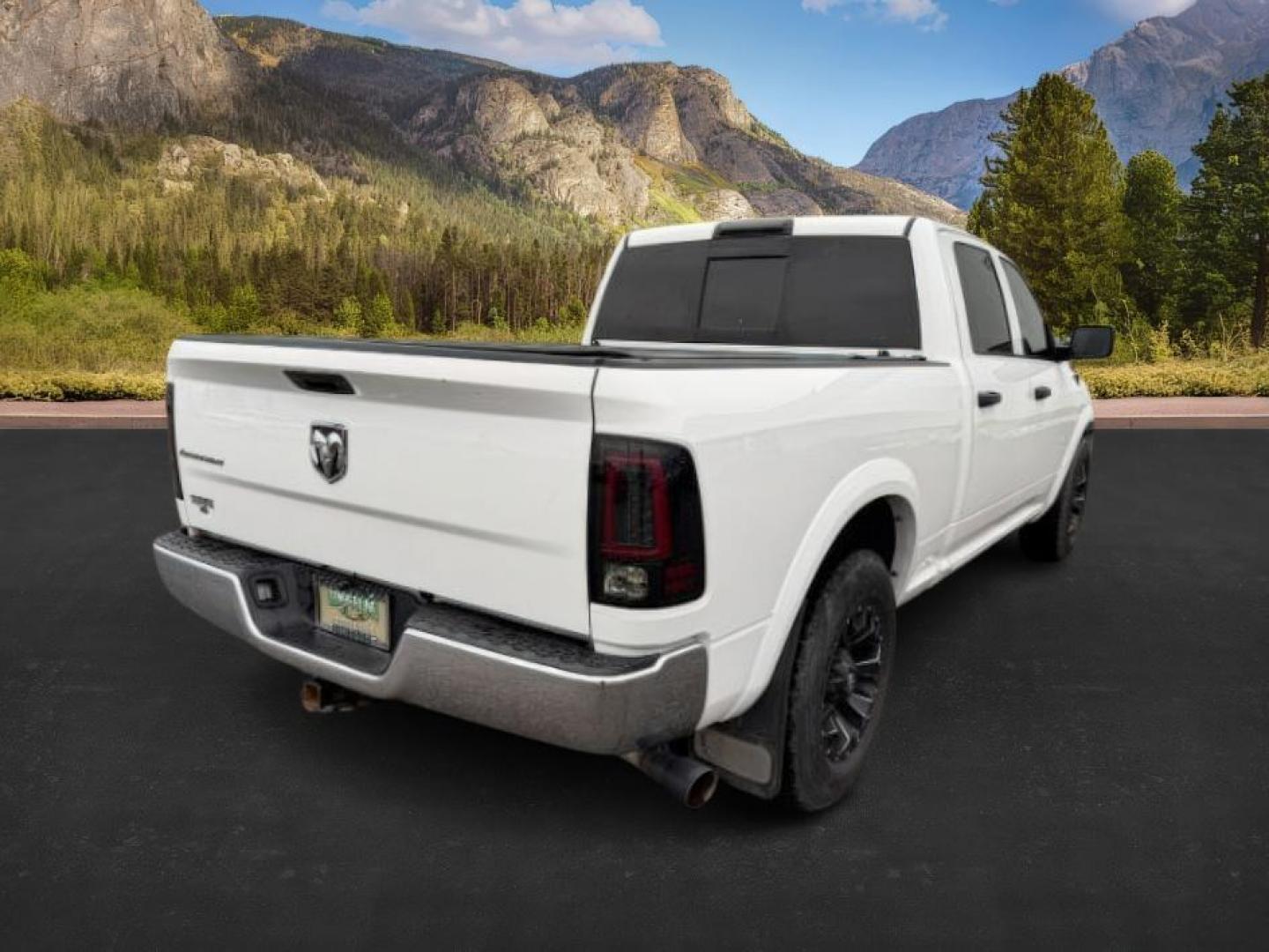 2016 WHITE /Diesel Grey/Black Ram 1500 (1C6RR7TT0GS) with an HEMI 57L V-8 variable valve control engine, Automatic transmission, located at 1175 N Woodruff Ave, Idaho Falls, ID, 83401, 43.506901, -111.999657 - At Timberline Auto, finding a great deal on your next vehicle is always easy! Our experienced sales staff's goal is to help find you the right vehicle at the right price! Our knowledgeable finance department has options for almost any credit score. We offer extended service contract options to prote - Photo#4