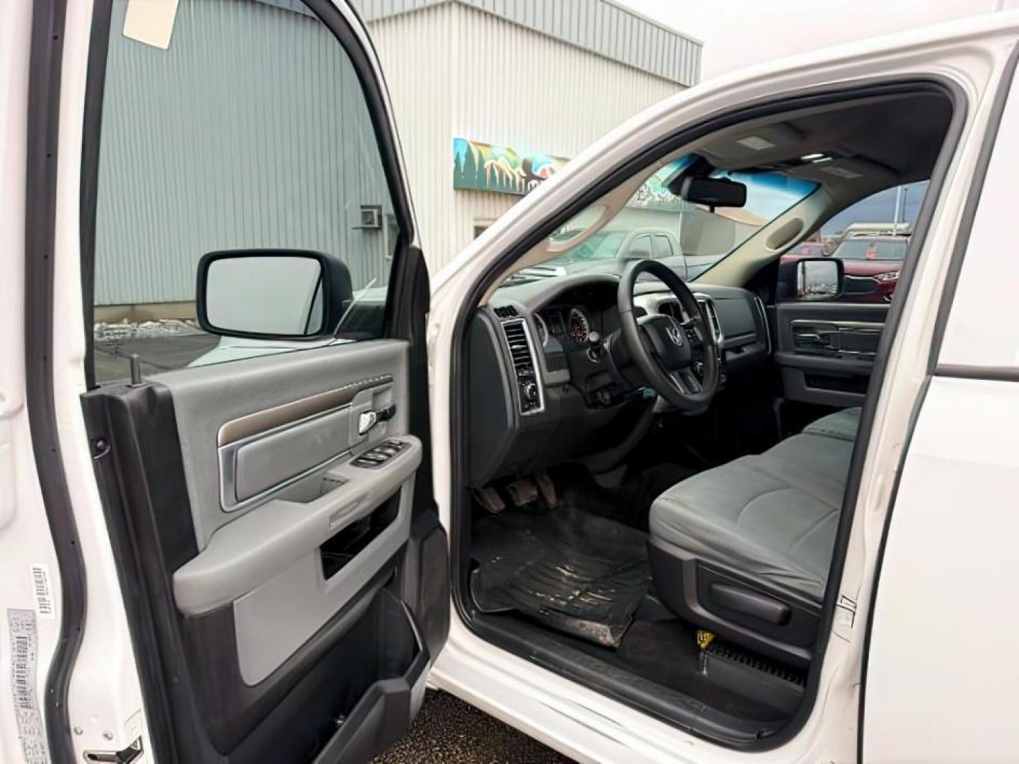 2016 WHITE /Diesel Grey/Black Ram 1500 (1C6RR7TT0GS) with an HEMI 57L V-8 variable valve control engine, Automatic transmission, located at 1175 N Woodruff Ave, Idaho Falls, ID, 83401, 43.506901, -111.999657 - At Timberline Auto, finding a great deal on your next vehicle is always easy! Our experienced sales staff's goal is to help find you the right vehicle at the right price! Our knowledgeable finance department has options for almost any credit score. We offer extended service contract options to prote - Photo#9