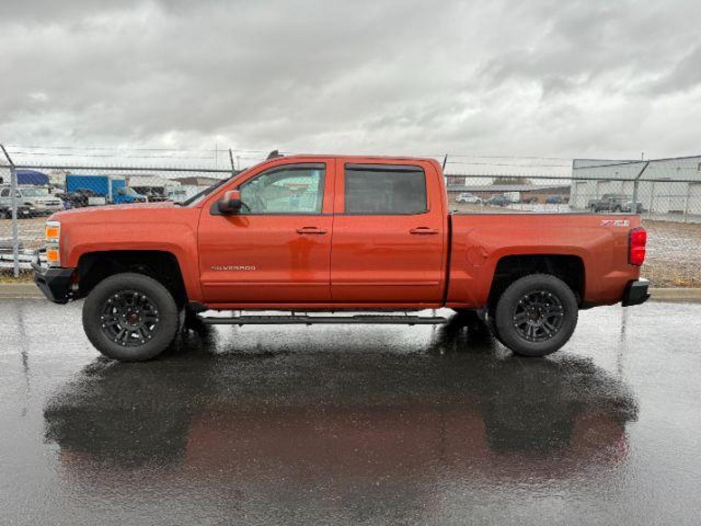 2015 ORANGE /CLOTH Chevrolet Silverado 1500 (3GCUKREC5FG) with an 53L V8 VORTEC engine, Automatic transmission, located at 1175 N Woodruff Ave, Idaho Falls, ID, 83401, 43.506901, -111.999657 - At Timberline Auto, finding a great deal on your next vehicle is always easy! Our experienced sales staff's goal is to help find you the right vehicle at the right price! Our knowledgeable finance department has options for almost any credit score. We offer extended service contract options to prote - Photo#1