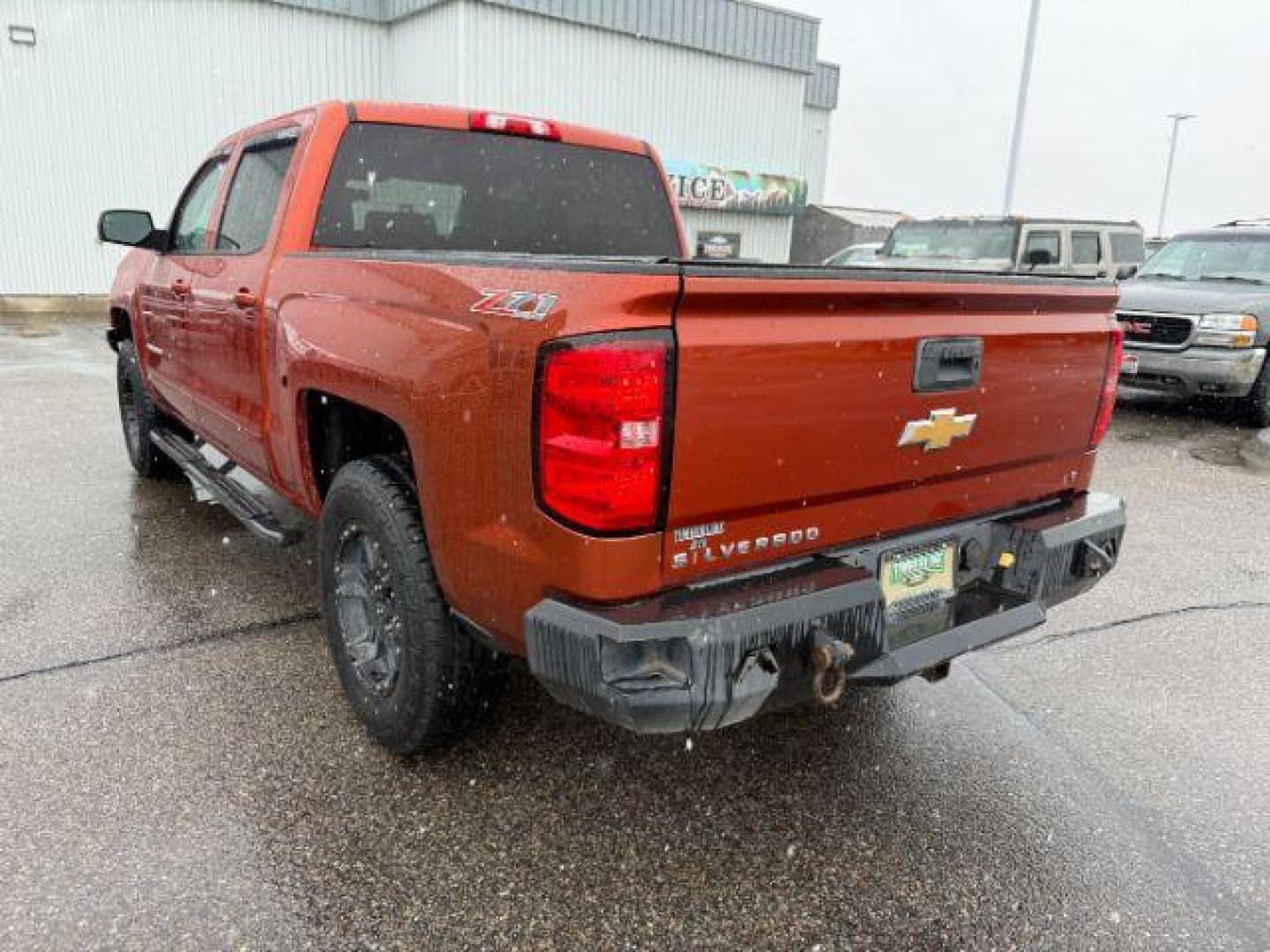 2015 ORANGE /CLOTH Chevrolet Silverado 1500 (3GCUKREC5FG) with an 53L V8 VORTEC engine, Automatic transmission, located at 1175 N Woodruff Ave, Idaho Falls, ID, 83401, 43.506901, -111.999657 - At Timberline Auto, finding a great deal on your next vehicle is always easy! Our experienced sales staff's goal is to help find you the right vehicle at the right price! Our knowledgeable finance department has options for almost any credit score. We offer extended service contract options to prote - Photo#2