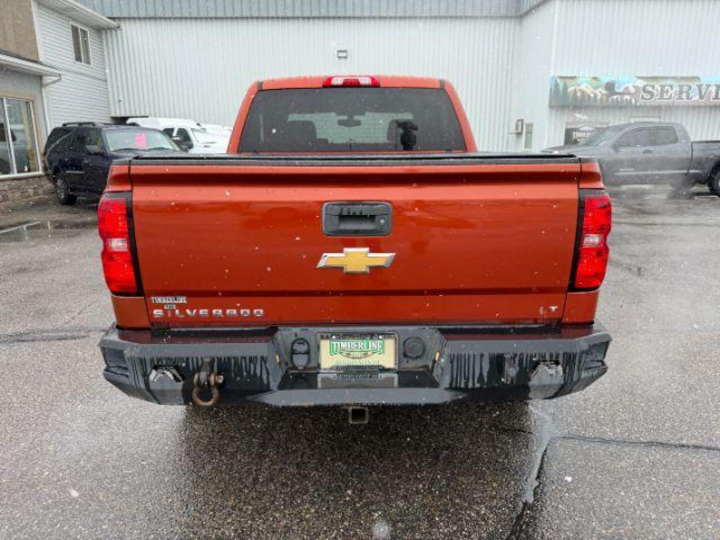 2015 ORANGE /CLOTH Chevrolet Silverado 1500 (3GCUKREC5FG) with an 53L V8 VORTEC engine, Automatic transmission, located at 1175 N Woodruff Ave, Idaho Falls, ID, 83401, 43.506901, -111.999657 - At Timberline Auto, finding a great deal on your next vehicle is always easy! Our experienced sales staff's goal is to help find you the right vehicle at the right price! Our knowledgeable finance department has options for almost any credit score. We offer extended service contract options to prote - Photo#3