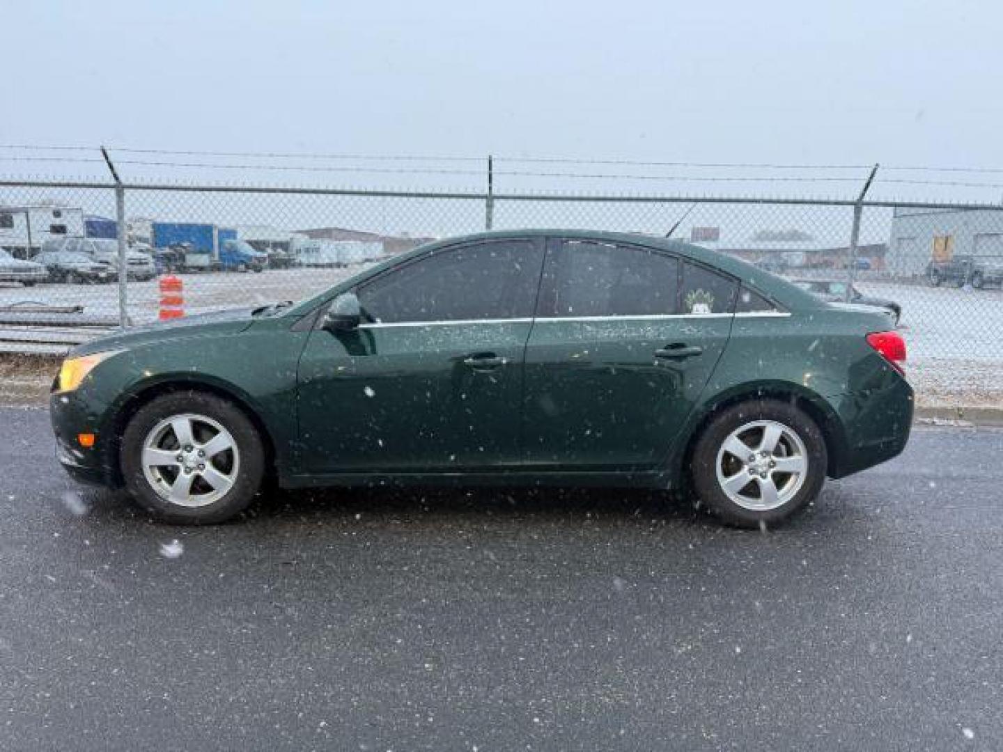 2014 GREEN /CLOTH Chevrolet Cruze (1G1PC5SB8E7) with an 14L I4 TURBO engine, Automatic transmission, located at 1175 N Woodruff Ave, Idaho Falls, ID, 83401, 43.506901, -111.999657 - At Timberline Auto, finding a great deal on your next vehicle is always easy! Our experienced sales staff's goal is to help find you the right vehicle at the right price! Our knowledgeable finance department has options for almost any credit score. We offer extended service contract options to prote - Photo#1