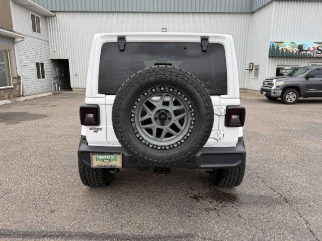 2021 WHITE /Black Jeep Wrangler Unlimited (1C4HJXEN5MW) with an 20L I4 TURBO engine, Automatic transmission, located at 1175 N Woodruff Ave, Idaho Falls, ID, 83401, 43.506901, -111.999657 - Adventure is calling, and this 2021 Jeep Wrangler Unlimited Sahara 4wd is ready to answer! Finished in stunning pearl white with the sought after hardtop, this Wrangler combines legendary Jeep capability with premium comfort and unmistakable style. Conquer trails, snow, mud, and everything in betw- Photo#32