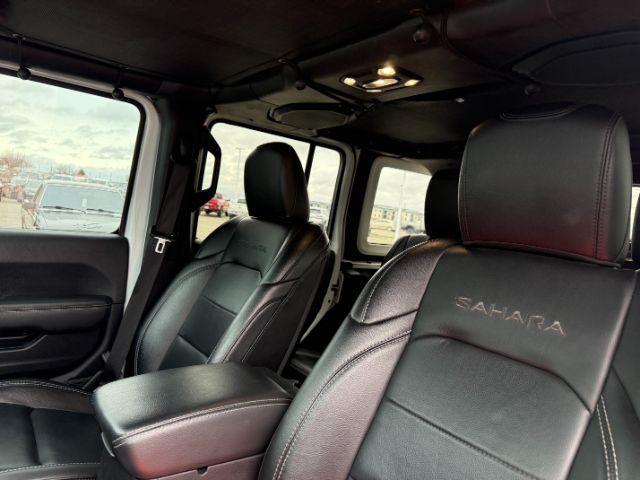 2021 WHITE /Black Jeep Wrangler Unlimited (1C4HJXEN5MW) with an 20L I4 TURBO engine, Automatic transmission, located at 1175 N Woodruff Ave, Idaho Falls, ID, 83401, 43.506901, -111.999657 - Adventure is calling, and this 2021 Jeep Wrangler Unlimited Sahara 4wd is ready to answer! Finished in stunning pearl white with the sought after hardtop, this Wrangler combines legendary Jeep capability with premium comfort and unmistakable style. Conquer trails, snow, mud, and everything in betw- Photo#52