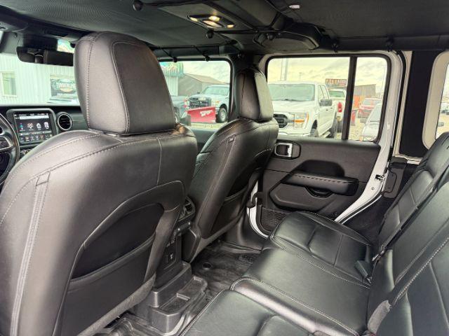 2021 WHITE /Black Jeep Wrangler Unlimited (1C4HJXEN5MW) with an 20L I4 TURBO engine, Automatic transmission, located at 1175 N Woodruff Ave, Idaho Falls, ID, 83401, 43.506901, -111.999657 - Adventure is calling, and this 2021 Jeep Wrangler Unlimited Sahara 4wd is ready to answer! Finished in stunning pearl white with the sought after hardtop, this Wrangler combines legendary Jeep capability with premium comfort and unmistakable style. Conquer trails, snow, mud, and everything in betw- Photo#56
