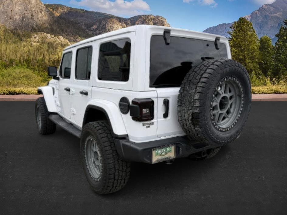 2021 WHITE /Black Jeep Wrangler Unlimited (1C4HJXEN5MW) with an 20L I4 TURBO engine, Automatic transmission, located at 1175 N Woodruff Ave, Idaho Falls, ID, 83401, 43.506901, -111.999657 - Adventure is calling, and this 2021 Jeep Wrangler Unlimited Sahara 4wd is ready to answer! Finished in stunning pearl white with the sought after hardtop, this Wrangler combines legendary Jeep capability with premium comfort and unmistakable style. Conquer trails, snow, mud, and everything in betw- Photo#2