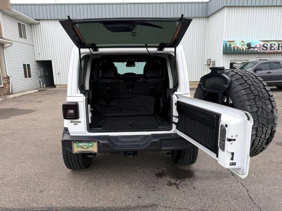 2021 WHITE /Black Jeep Wrangler Unlimited (1C4HJXEN5MW) with an 20L I4 TURBO engine, Automatic transmission, located at 1175 N Woodruff Ave, Idaho Falls, ID, 83401, 43.506901, -111.999657 - Adventure is calling, and this 2021 Jeep Wrangler Unlimited Sahara 4wd is ready to answer! Finished in stunning pearl white with the sought after hardtop, this Wrangler combines legendary Jeep capability with premium comfort and unmistakable style. Conquer trails, snow, mud, and everything in betw- Photo#5