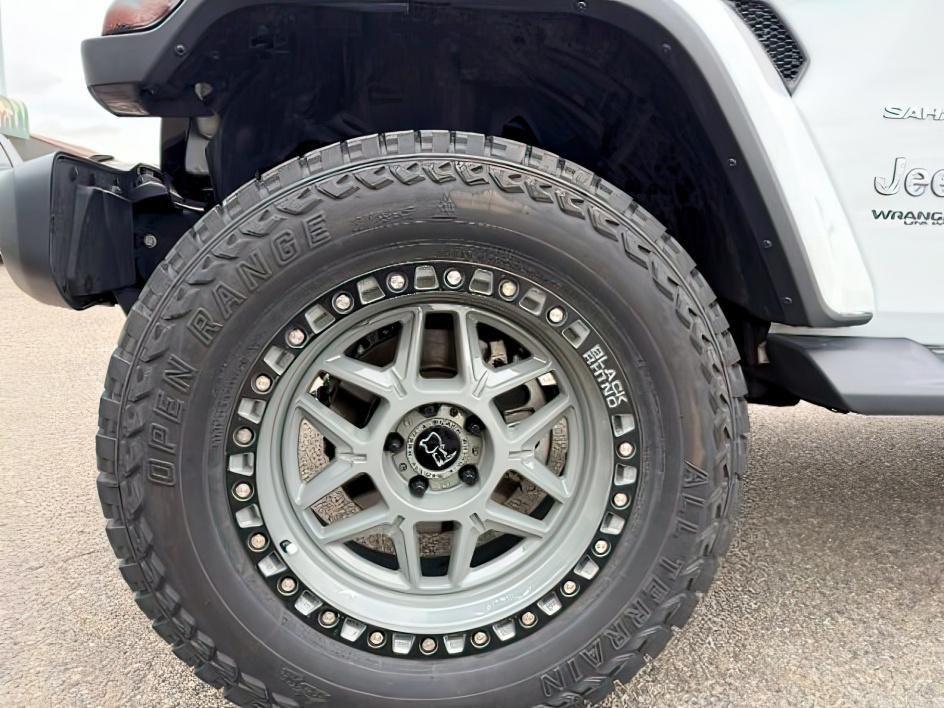 2021 WHITE /Black Jeep Wrangler Unlimited (1C4HJXEN5MW) with an 20L I4 TURBO engine, Automatic transmission, located at 1175 N Woodruff Ave, Idaho Falls, ID, 83401, 43.506901, -111.999657 - Adventure is calling, and this 2021 Jeep Wrangler Unlimited Sahara 4wd is ready to answer! Finished in stunning pearl white with the sought after hardtop, this Wrangler combines legendary Jeep capability with premium comfort and unmistakable style. Conquer trails, snow, mud, and everything in betw- Photo#14
