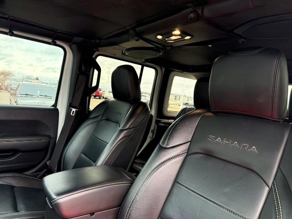 2021 WHITE /Black Jeep Wrangler Unlimited (1C4HJXEN5MW) with an 20L I4 TURBO engine, Automatic transmission, located at 1175 N Woodruff Ave, Idaho Falls, ID, 83401, 43.506901, -111.999657 - Adventure is calling, and this 2021 Jeep Wrangler Unlimited Sahara 4wd is ready to answer! Finished in stunning pearl white with the sought after hardtop, this Wrangler combines legendary Jeep capability with premium comfort and unmistakable style. Conquer trails, snow, mud, and everything in betw- Photo#23