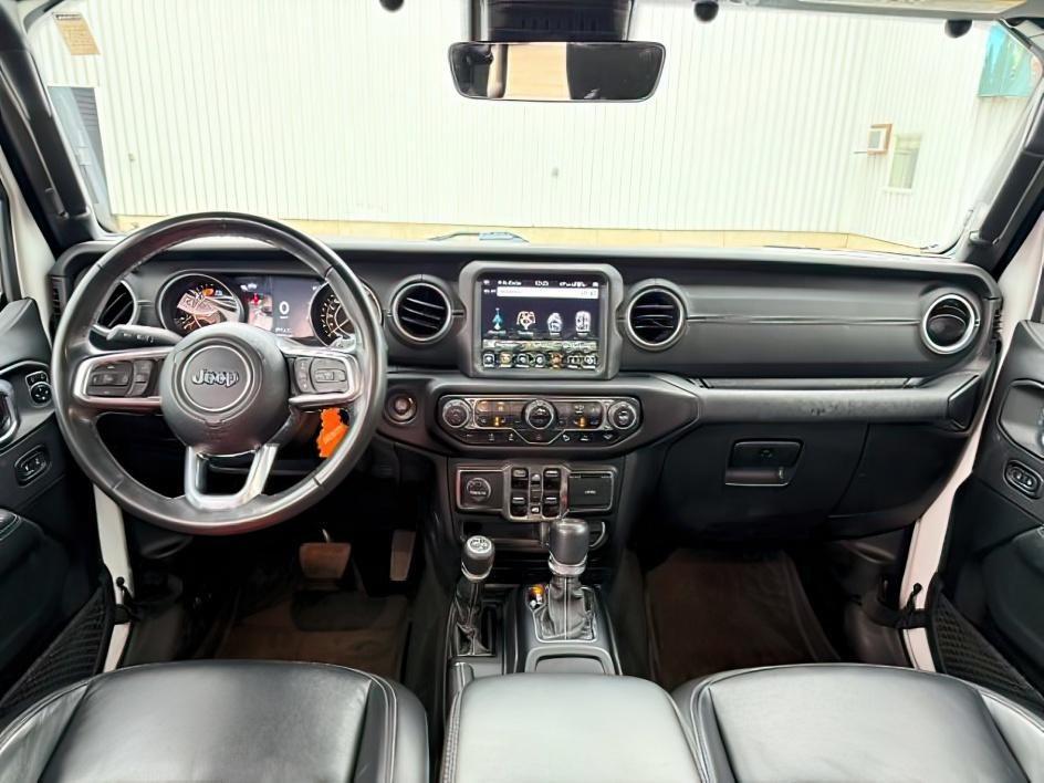 2021 WHITE /Black Jeep Wrangler Unlimited (1C4HJXEN5MW) with an 20L I4 TURBO engine, Automatic transmission, located at 1175 N Woodruff Ave, Idaho Falls, ID, 83401, 43.506901, -111.999657 - Adventure is calling, and this 2021 Jeep Wrangler Unlimited Sahara 4wd is ready to answer! Finished in stunning pearl white with the sought after hardtop, this Wrangler combines legendary Jeep capability with premium comfort and unmistakable style. Conquer trails, snow, mud, and everything in betw- Photo#25