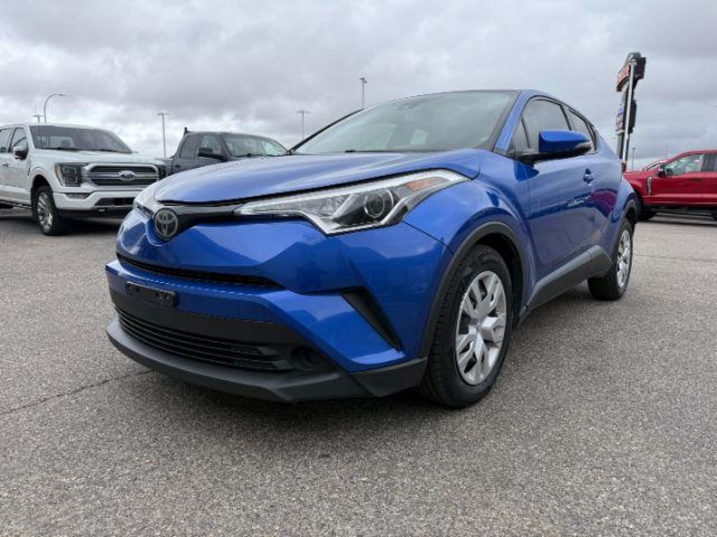 2019 BLUE /Black Toyota C-HR (JTNKHMBX4K1) with an 2L I-4 DOHC engine, Automatic transmission, located at 1175 N Woodruff Ave, Idaho Falls, ID, 83401, 43.506901, -111.999657 - At Timberline Auto, finding a great deal on your next vehicle is always easy! Our experienced sales staff's goal is to help find you the right vehicle at the right price! Our knowledgeable finance department has options for almost any credit score. We offer extended service contract options to prote - Photo#20