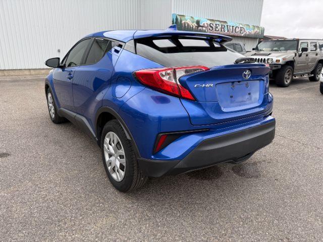 2019 BLUE /Black Toyota C-HR (JTNKHMBX4K1) with an 2L I-4 DOHC engine, Automatic transmission, located at 1175 N Woodruff Ave, Idaho Falls, ID, 83401, 43.506901, -111.999657 - This 2019 Toyota C-HR is a compact crossover built for efficient daily driving with easy maneuverability and a comfortable ride. Powered by a 2.0L 4-cylinder engine, it delivers solid fuel efficiency and dependable performance for commuting and around-town use. Its smaller footprint makes parking an- Photo#22