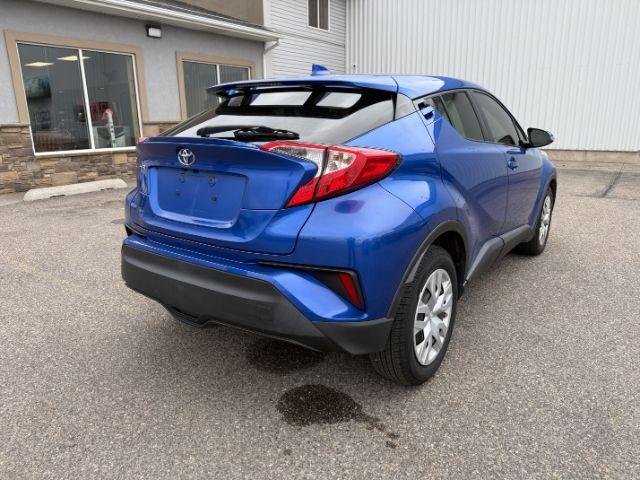 2019 BLUE /Black Toyota C-HR (JTNKHMBX4K1) with an 2L I-4 DOHC engine, Automatic transmission, located at 1175 N Woodruff Ave, Idaho Falls, ID, 83401, 43.506901, -111.999657 - This 2019 Toyota C-HR is a compact crossover built for efficient daily driving with easy maneuverability and a comfortable ride. Powered by a 2.0L 4-cylinder engine, it delivers solid fuel efficiency and dependable performance for commuting and around-town use. Its smaller footprint makes parking an- Photo#24